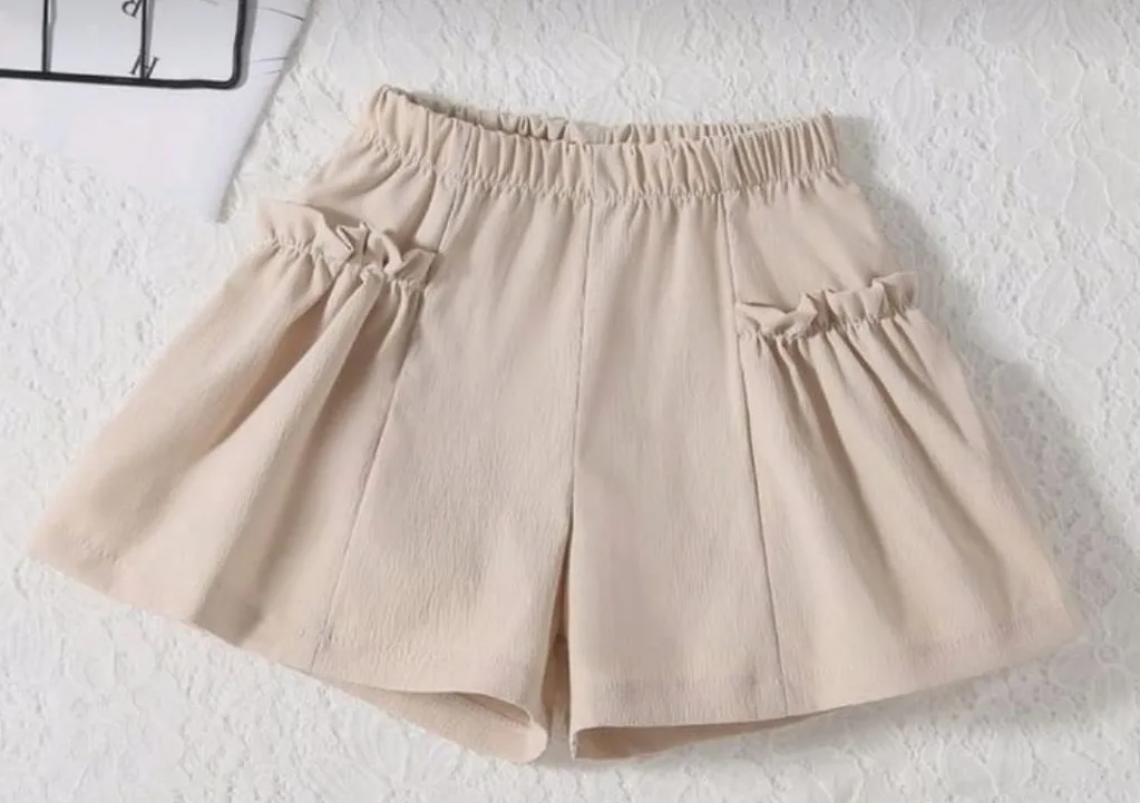 Girls Shorts 13: digital sewing pattern for girls — wide-leg shorts with ruffled pockets — Moldey