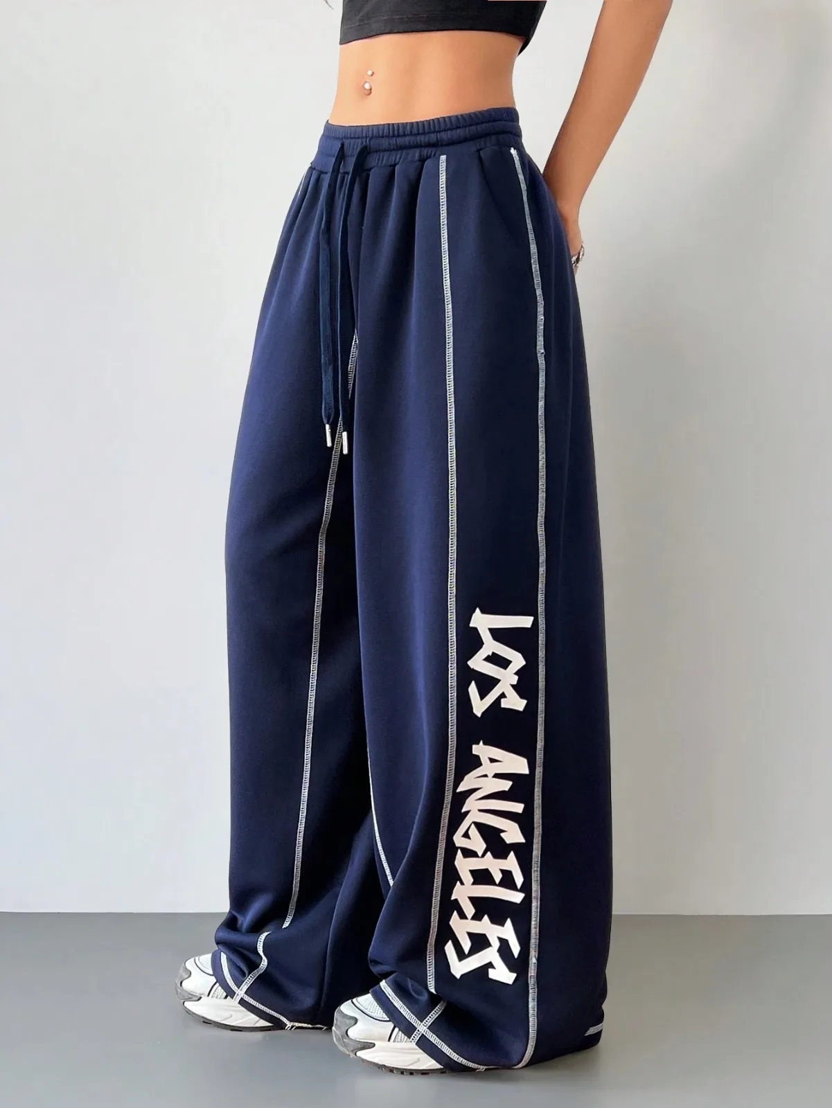 Jogger Pants 63-L: digital sewing pattern for women — wide-leg joggers with side graphic stripe — Moldey